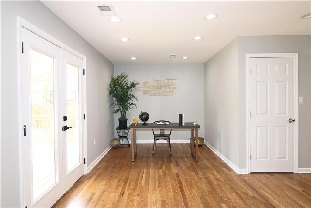 2450 Elkhorn Drive Decatur, GA 30034 - Photo 25 of 32 a view of a work space with wooden floor and furniture