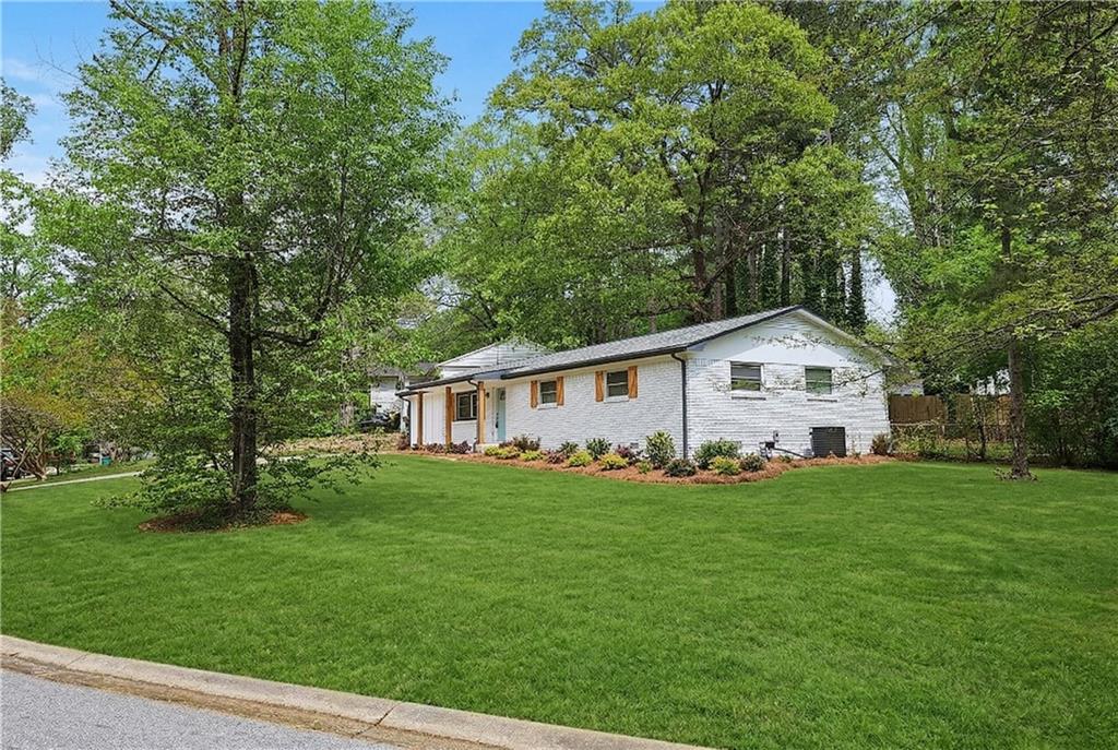 2450 Elkhorn Drive Decatur, GA 30034 - Photo 3 of 32 a front view of a house with a yard