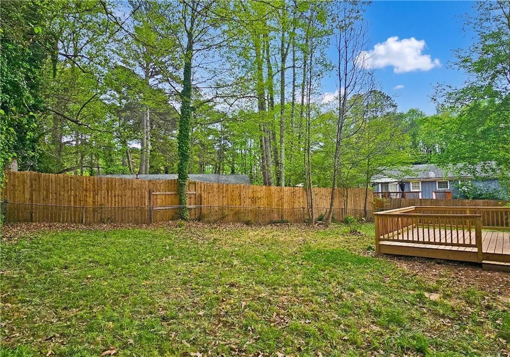 2450 Elkhorn Drive Decatur, GA 30034 - Photo 31 of 32 a view of a backyard with a fence