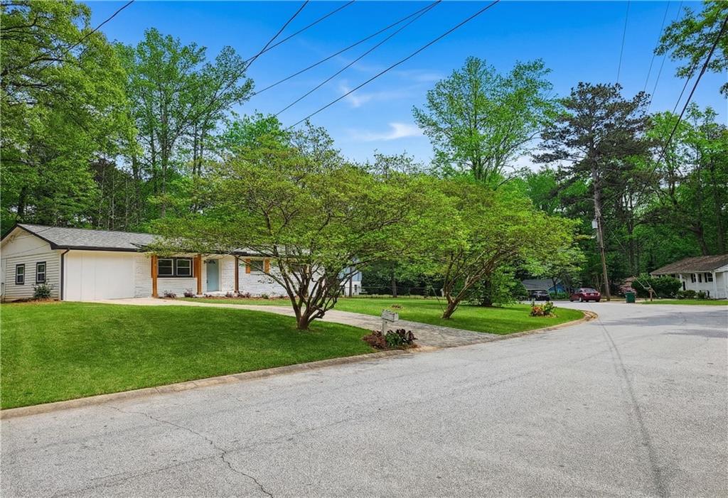 2450 Elkhorn Drive Decatur, GA 30034 - Photo 32 of 32 a view of a house with a yard and tree s
