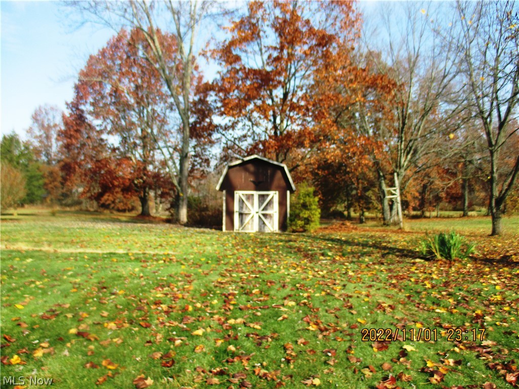 3729 Bassett Road Rootstown, OH 44272 - Photo 13 of 25 10X12 shed provides additional outside storage.