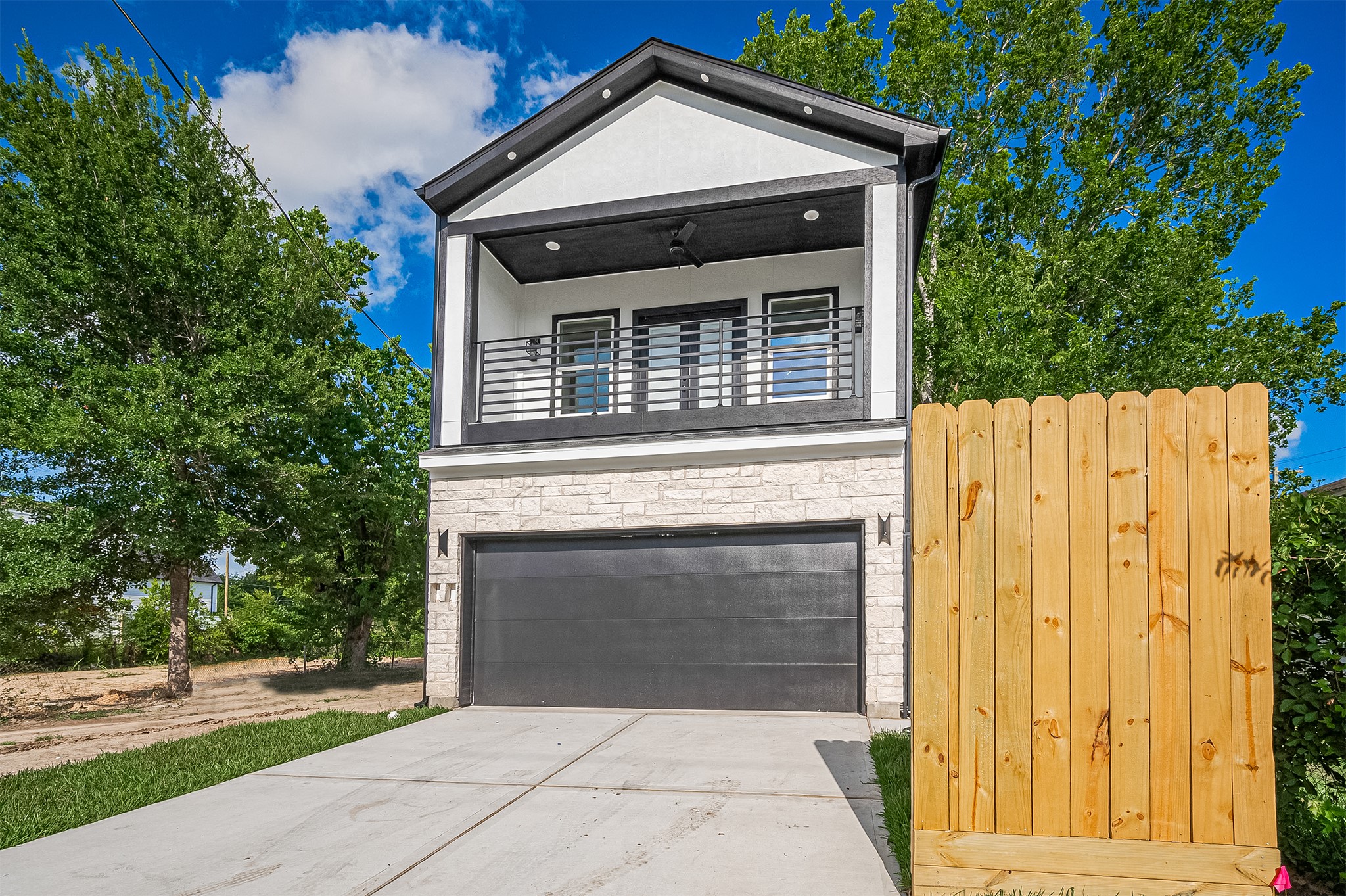 This newly built home in the University Area showcases sleek modern design with thoughtful finishes throughout. Ideal for Short Term Rental opportunities, featuring a spacious upper-level covered balcony and an extended driveway leading to a 2-car attached garage—combining comfort, curb appeal, and convenience.