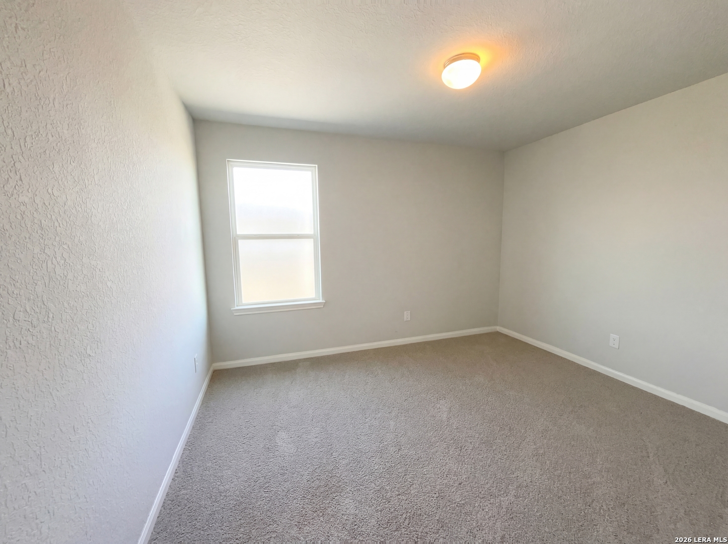 12325 Switchgrass San Antonio, TX 78252 - Photo 14 of 18 a view of a room that has a window in it