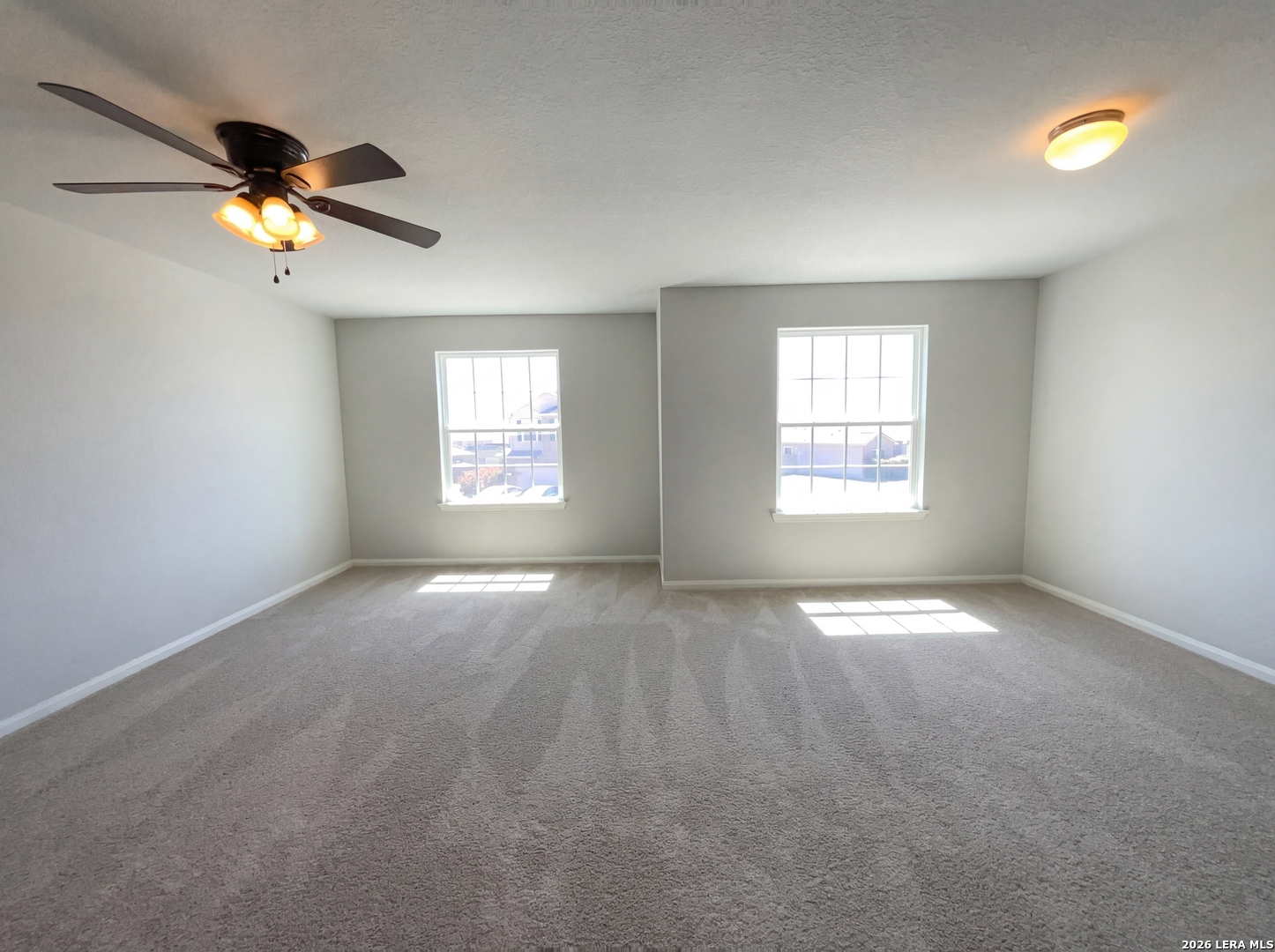 12325 Switchgrass San Antonio, TX 78252 - Photo 15 of 18 a view of an empty room with a window