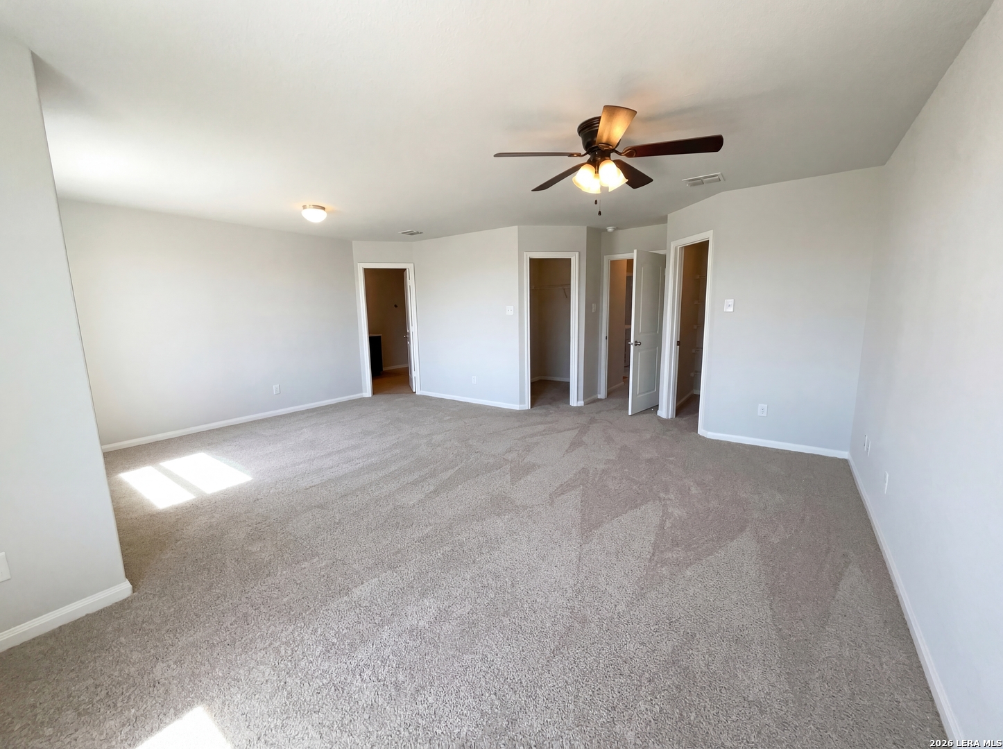 12325 Switchgrass San Antonio, TX 78252 - Photo 4 of 18 a view of a livingroom with a ceiling fan