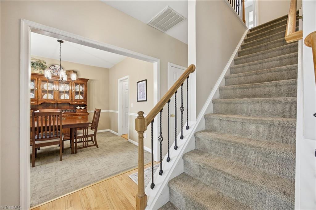 3659 Canopy Oak Court High Point, NC 27265 - Photo 23 of 42 View of the staircase to the upper floor.