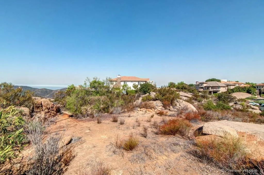 Crystal Ridge Escondido, CA 92026 - Photo 8 of 21 a view of a large building with a mountain in the background