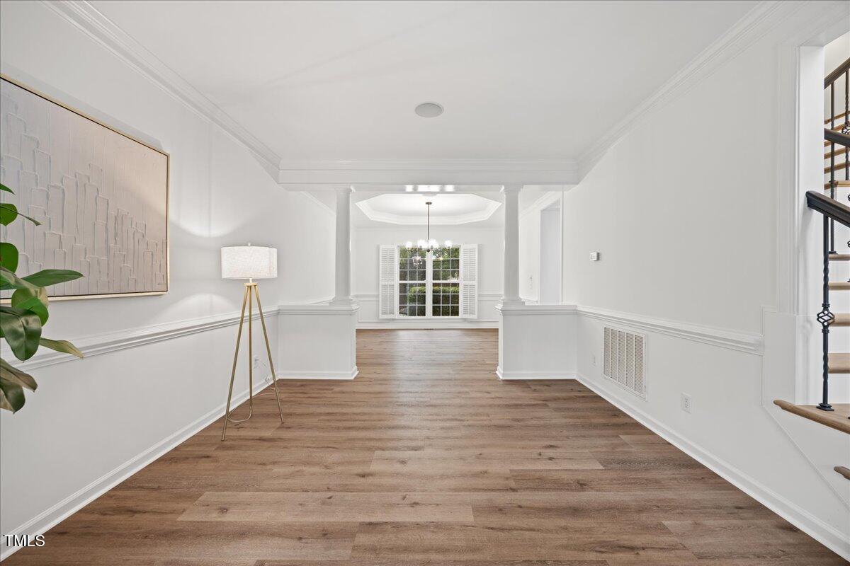 4 Pickard Place Durham, NC 27703 - Photo 23 of 80 a view of an empty room with wooden floor and a window