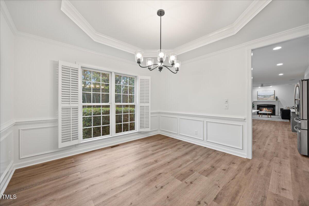 4 Pickard Place Durham, NC 27703 - Photo 24 of 80 wooden floor in an empty room with a window