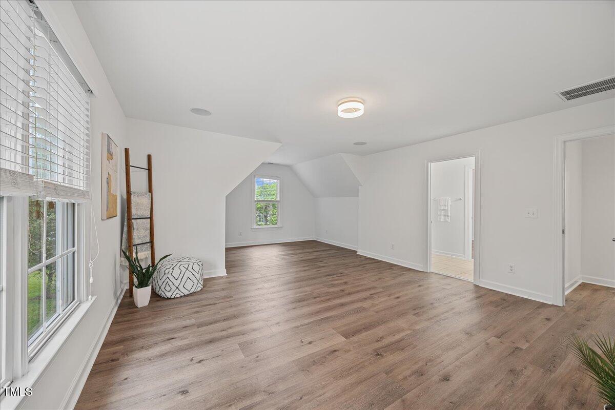 4 Pickard Place Durham, NC 27703 - Photo 27 of 80 a view of empty room with wooden floor and window