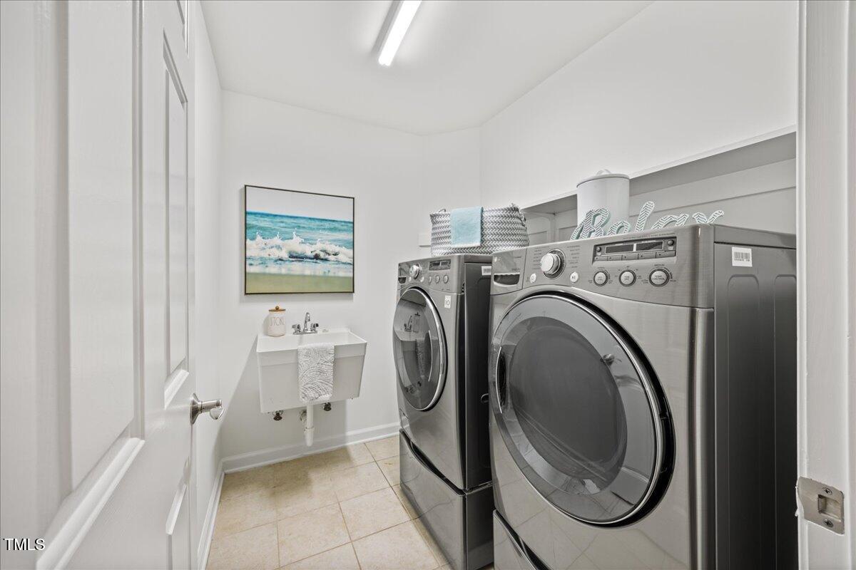 4 Pickard Place Durham, NC 27703 - Photo 41 of 80 a utility room with dryer and washer