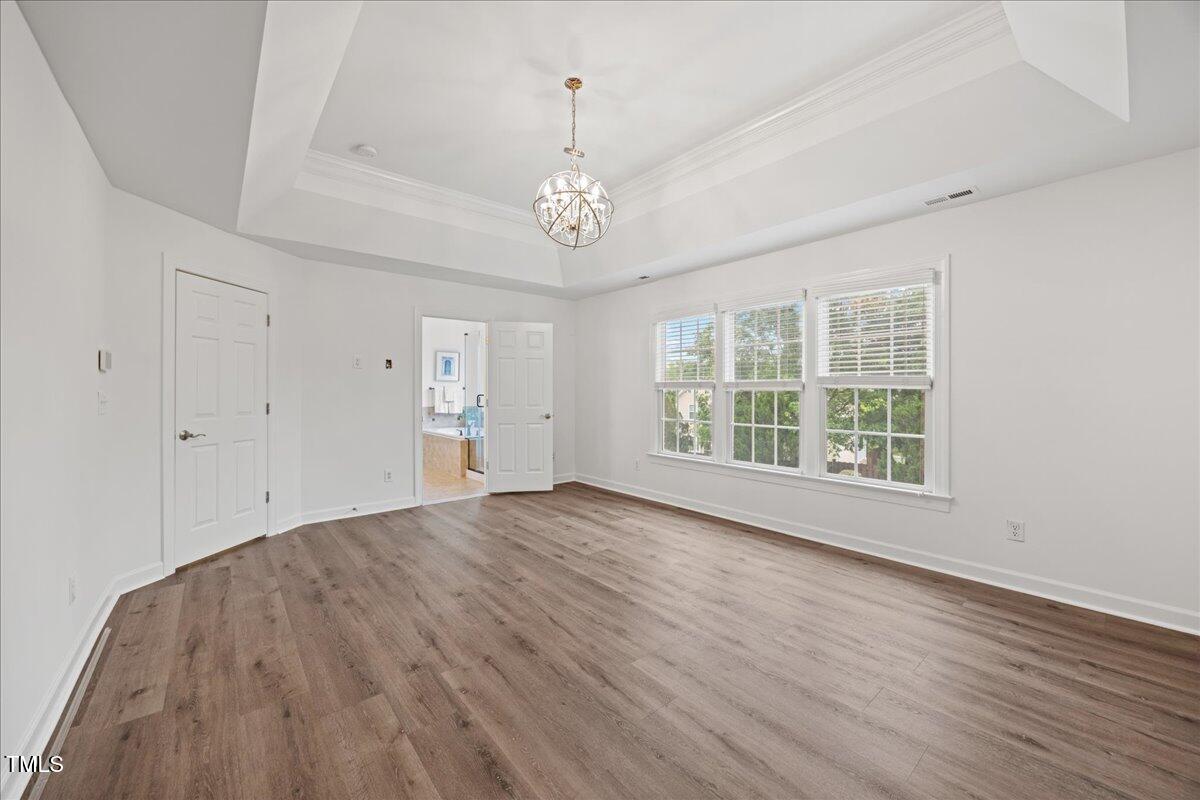 4 Pickard Place Durham, NC 27703 - Photo 44 of 80 wooden floor in an empty room with a window