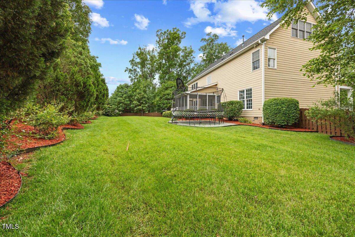4 Pickard Place Durham, NC 27703 - Photo 60 of 80 a view of a house with a yard and sitting area