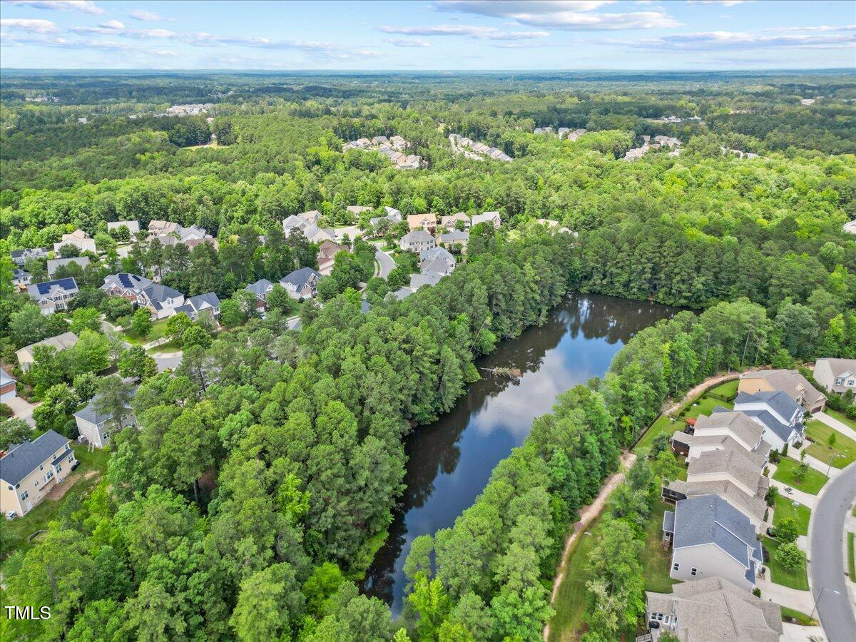 4 Pickard Place Durham, NC 27703 - Photo 66 of 80 a view of a city with lush green forest