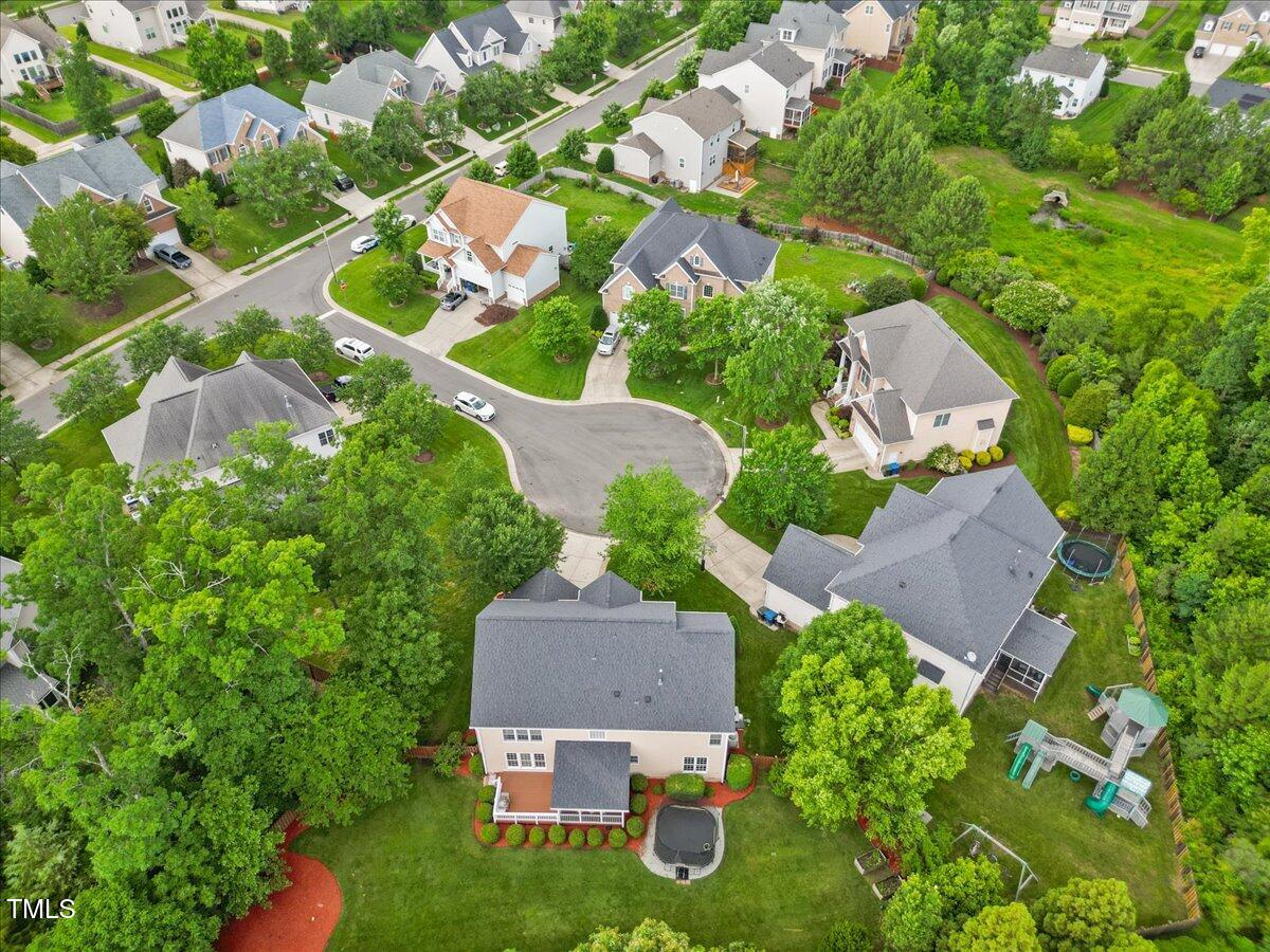 4 Pickard Place Durham, NC 27703 - Photo 73 of 80 an aerial view of residential houses with outdoor space and trees all around