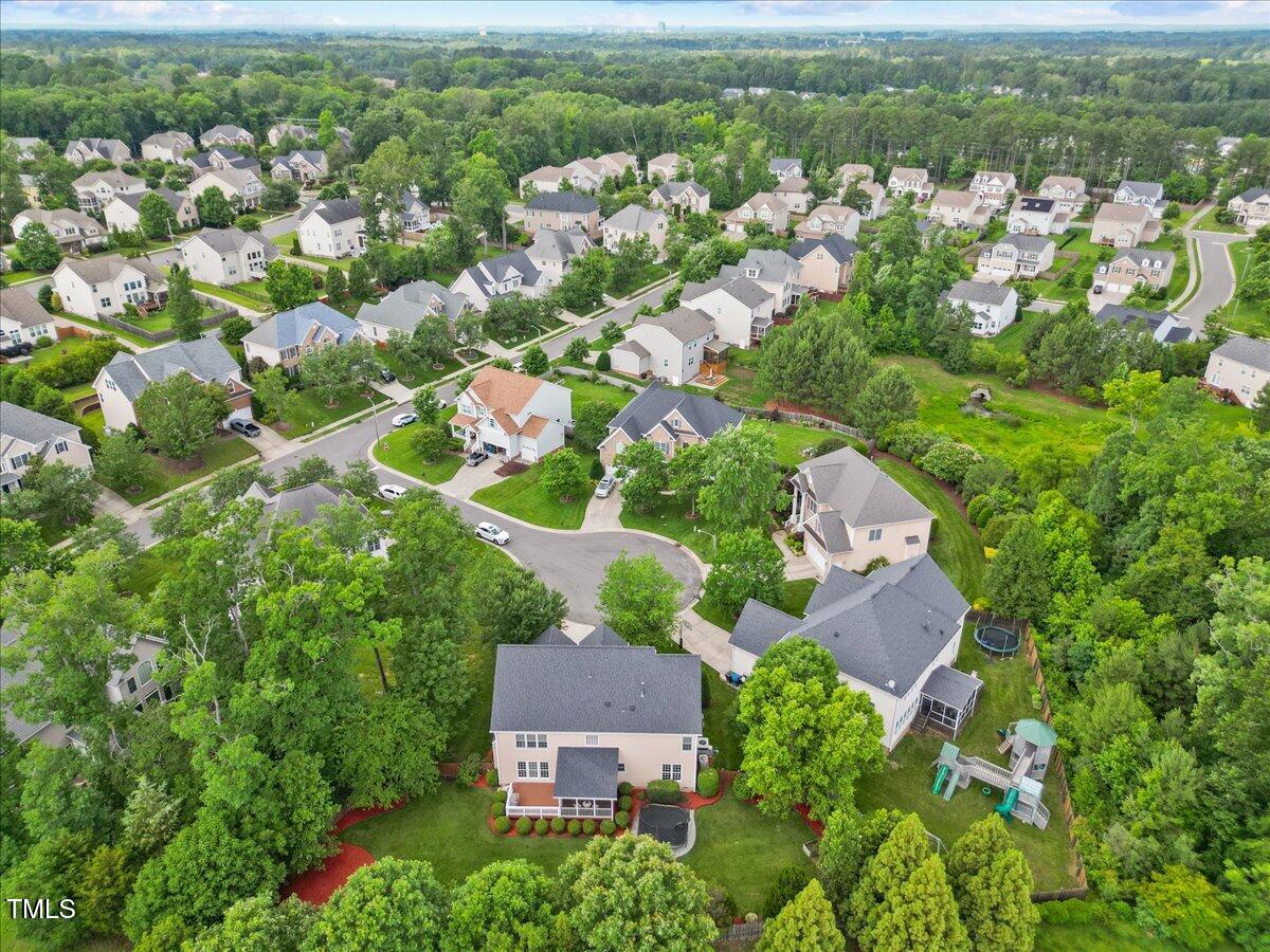 4 Pickard Place Durham, NC 27703 - Photo 74 of 80 an aerial view of residential houses with outdoor space and trees