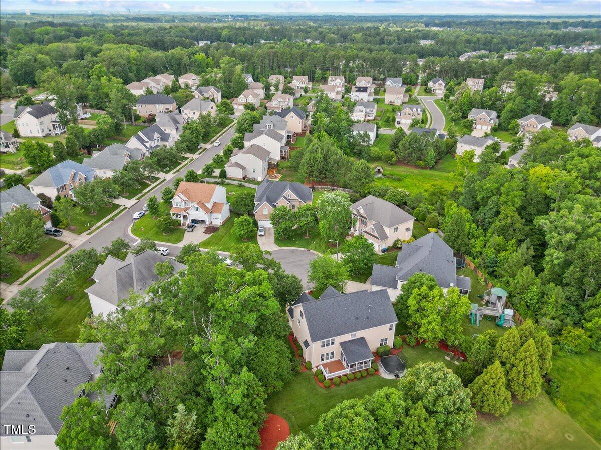 4 Pickard Place Durham, NC 27703 - Photo 75 of 80 an aerial view of residential houses with outdoor space and trees