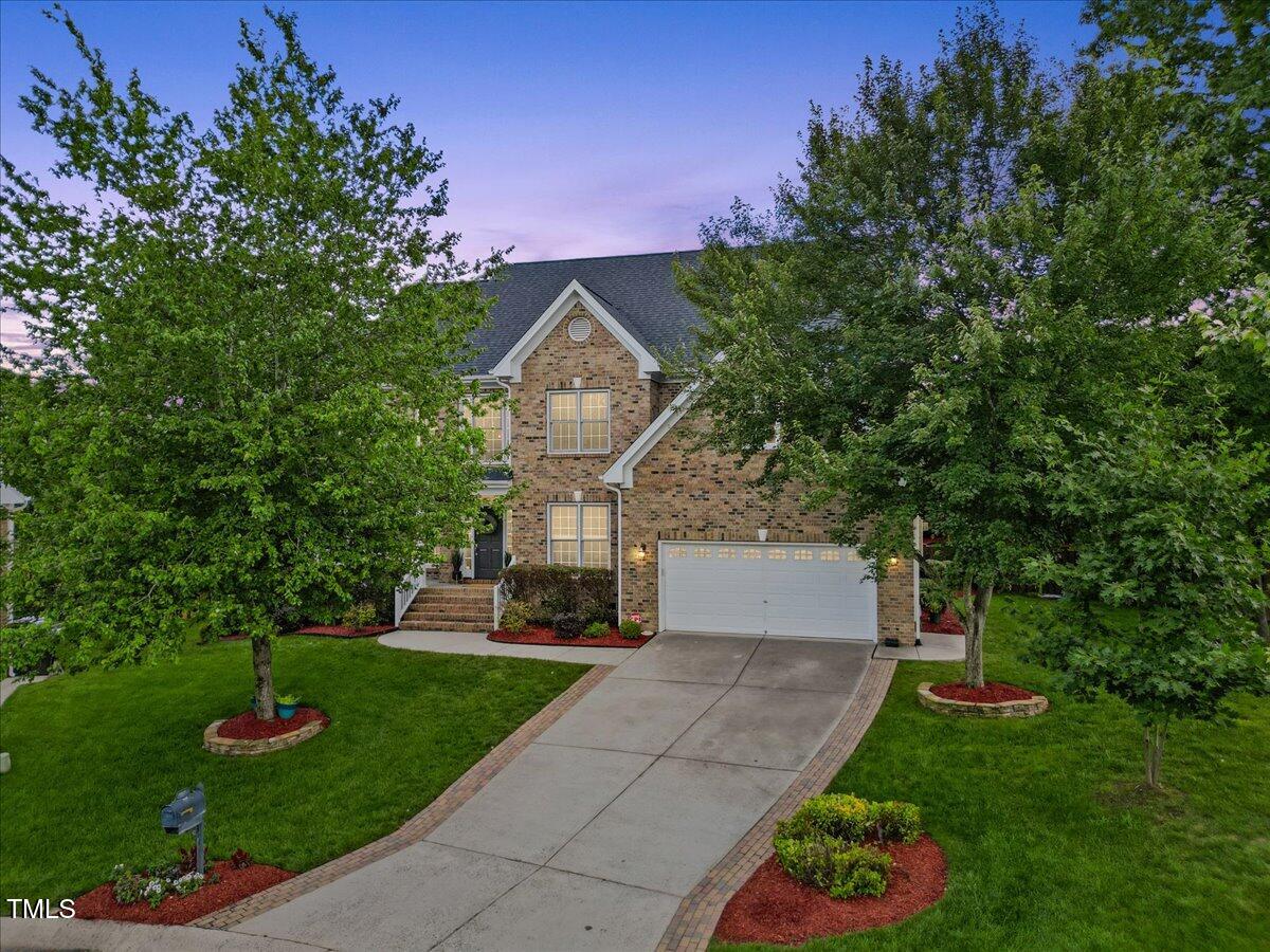 4 Pickard Place Durham, NC 27703 - Photo 79 of 80 a front view of a house with a garden and plants