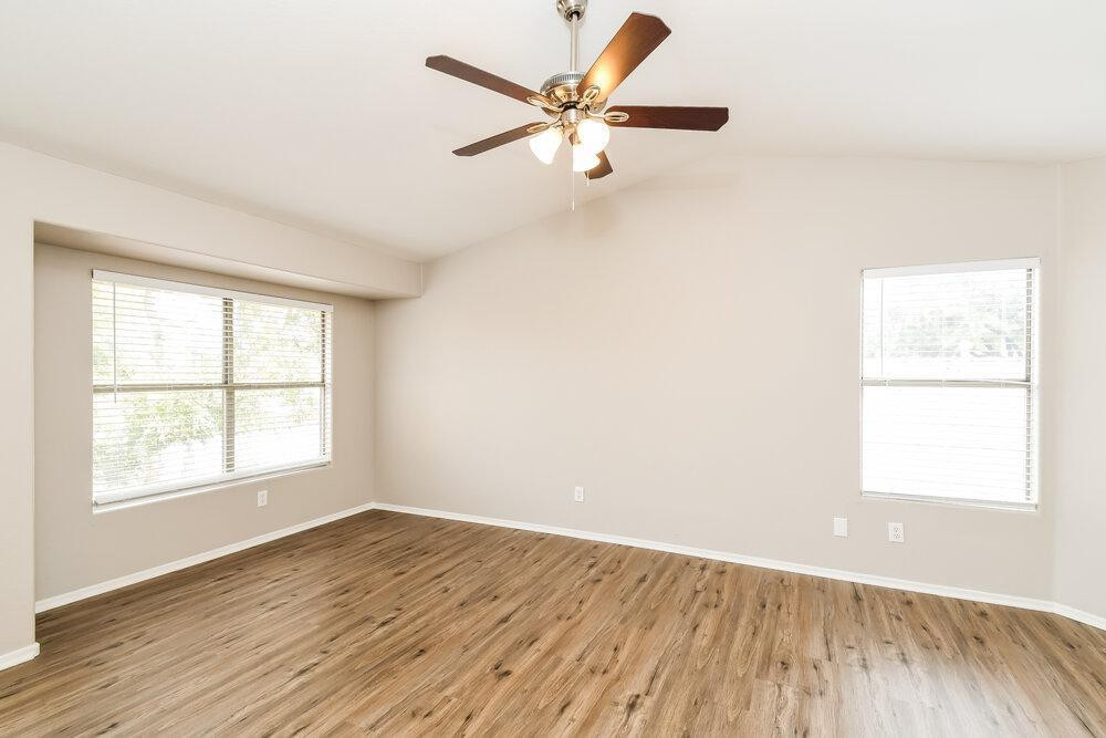 1766 East Tyson Street Gilbert, AZ 85295 - Photo 4 of 17 wooden floor in an empty room with a window