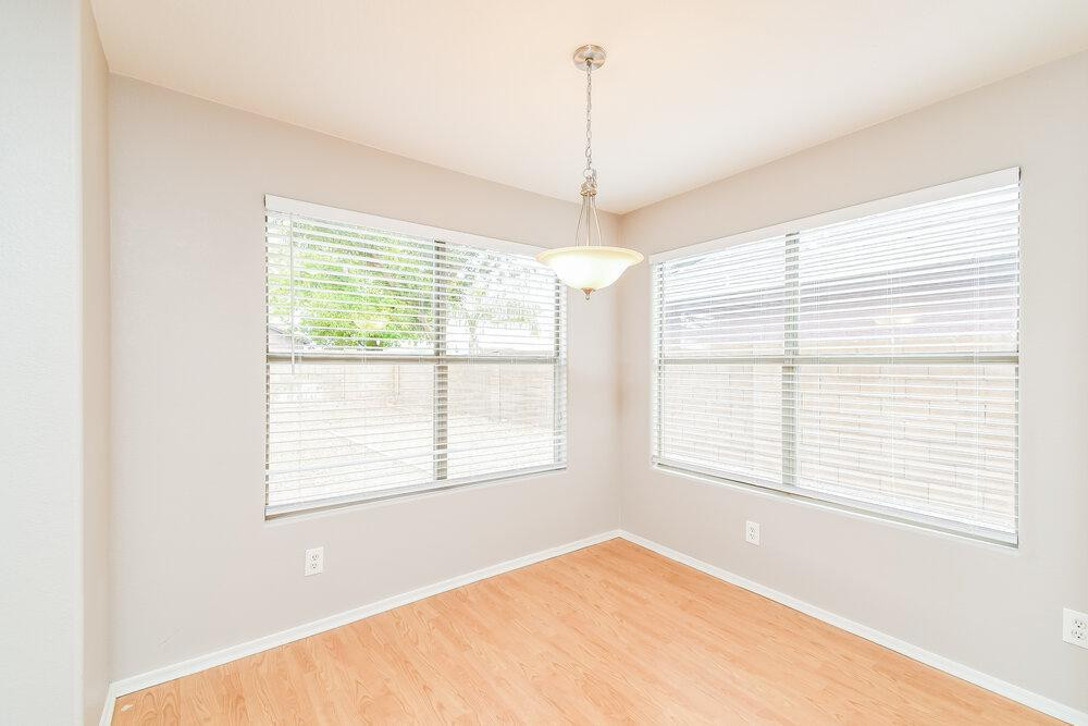 1766 East Tyson Street Gilbert, AZ 85295 - Photo 8 of 17 a view of an empty room with a window