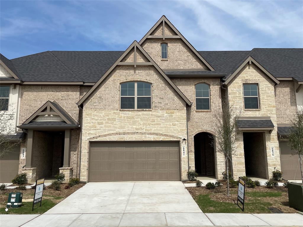 6841 Joelene Rae Drive Arlington, TX 76001 - Photo 1 of 1 a front view of a house with yard and parking