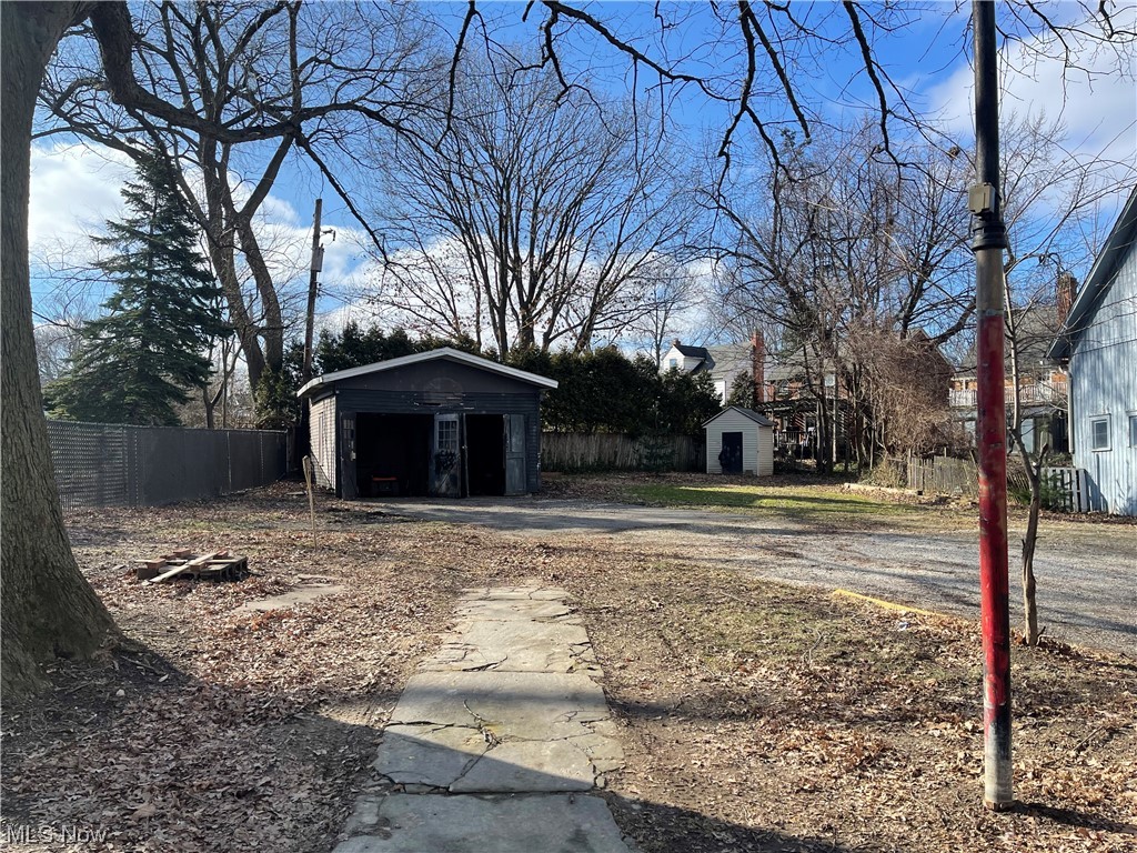 1909 West Schaaf Road Cleveland, OH 44109 - Photo 39 of 48 View of yard featuring a 2 car garage