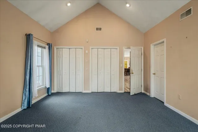 an empty room with windows