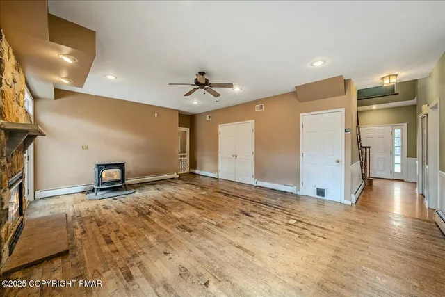 a view of fireplace and front door