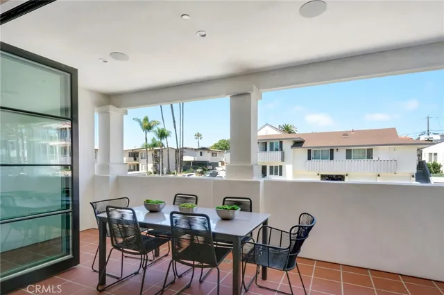 a view of kitchen with dining table and chairs