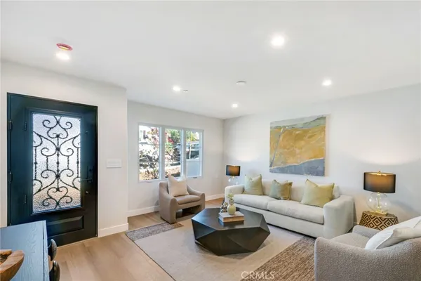 a living room with furniture and a couch