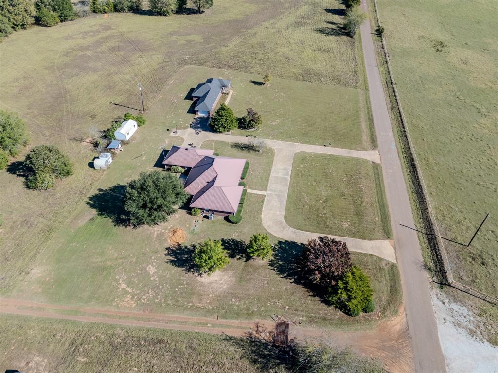 2895 County Road 118 Overton, TX 75684 - Photo 6 of 40 an aerial view of a house