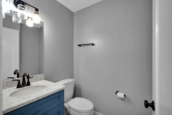 a view of a bathroom with a glass door shower