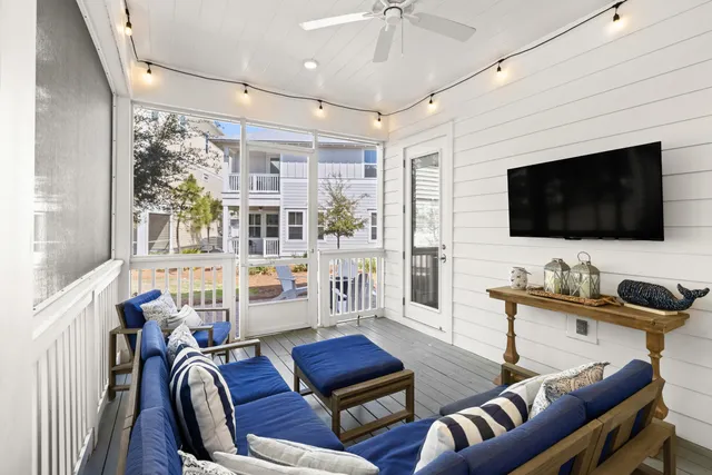 a kitchen with kitchen island a stove microwave and refrigerator