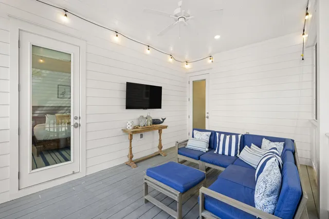a kitchen with kitchen island a stove microwave and refrigerator