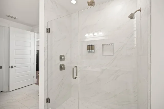 a view of a balcony with wooden floor