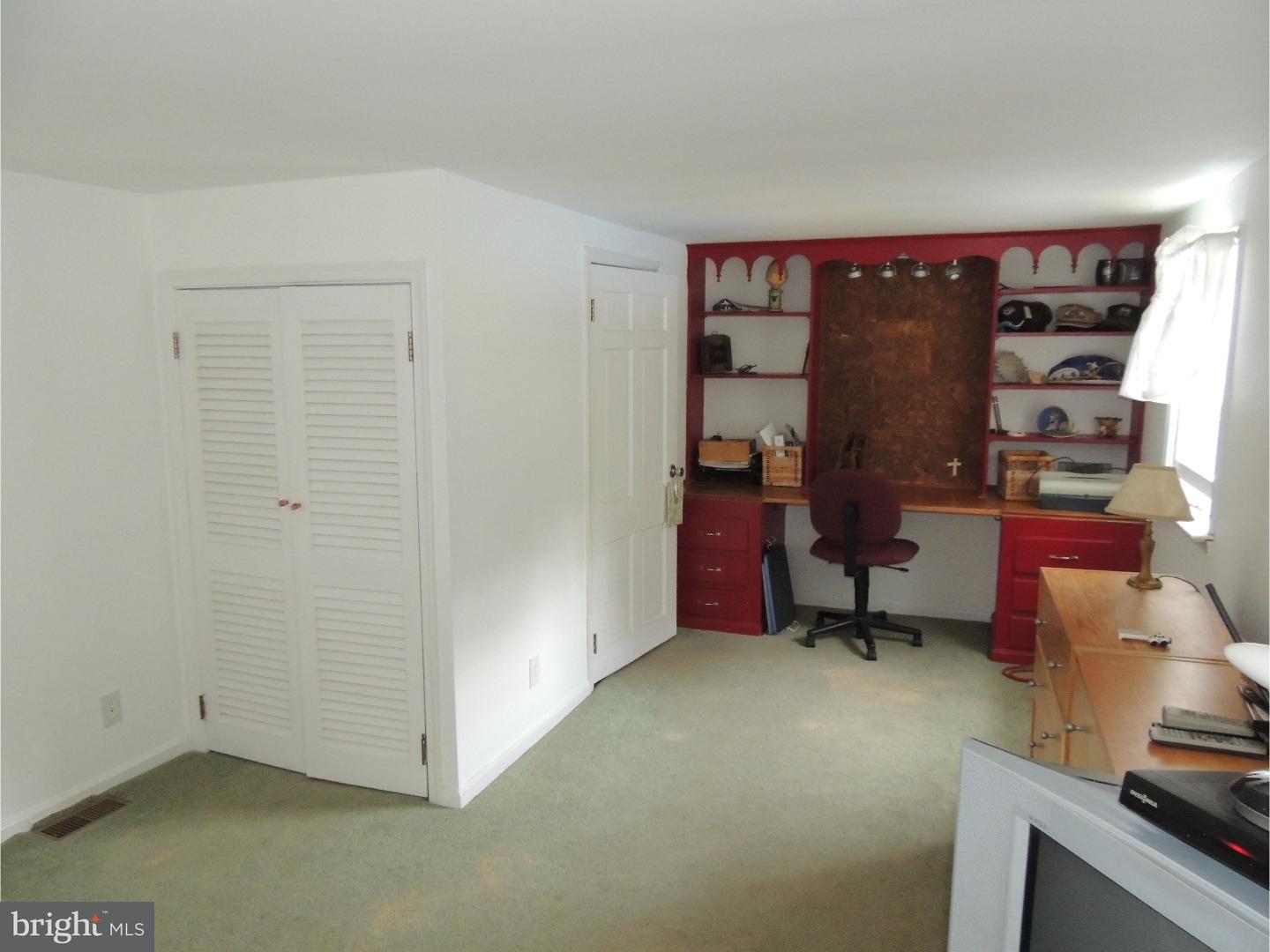 2380 Steven Road Huntingdon Valley, PA 19006 - Photo 14 of 24 a view of an empty room with a fireplace