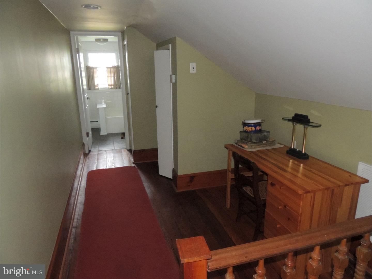 2380 Steven Road Huntingdon Valley, PA 19006 - Photo 17 of 24 a view of a hallway with wooden floor and stairs
