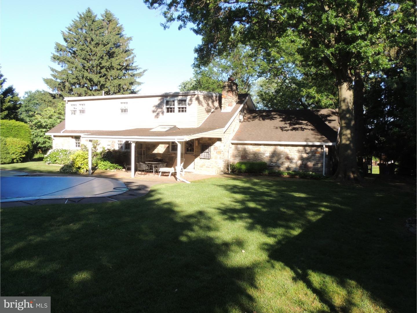 2380 Steven Road Huntingdon Valley, PA 19006 - Photo 20 of 24 a front view of a house with a garden