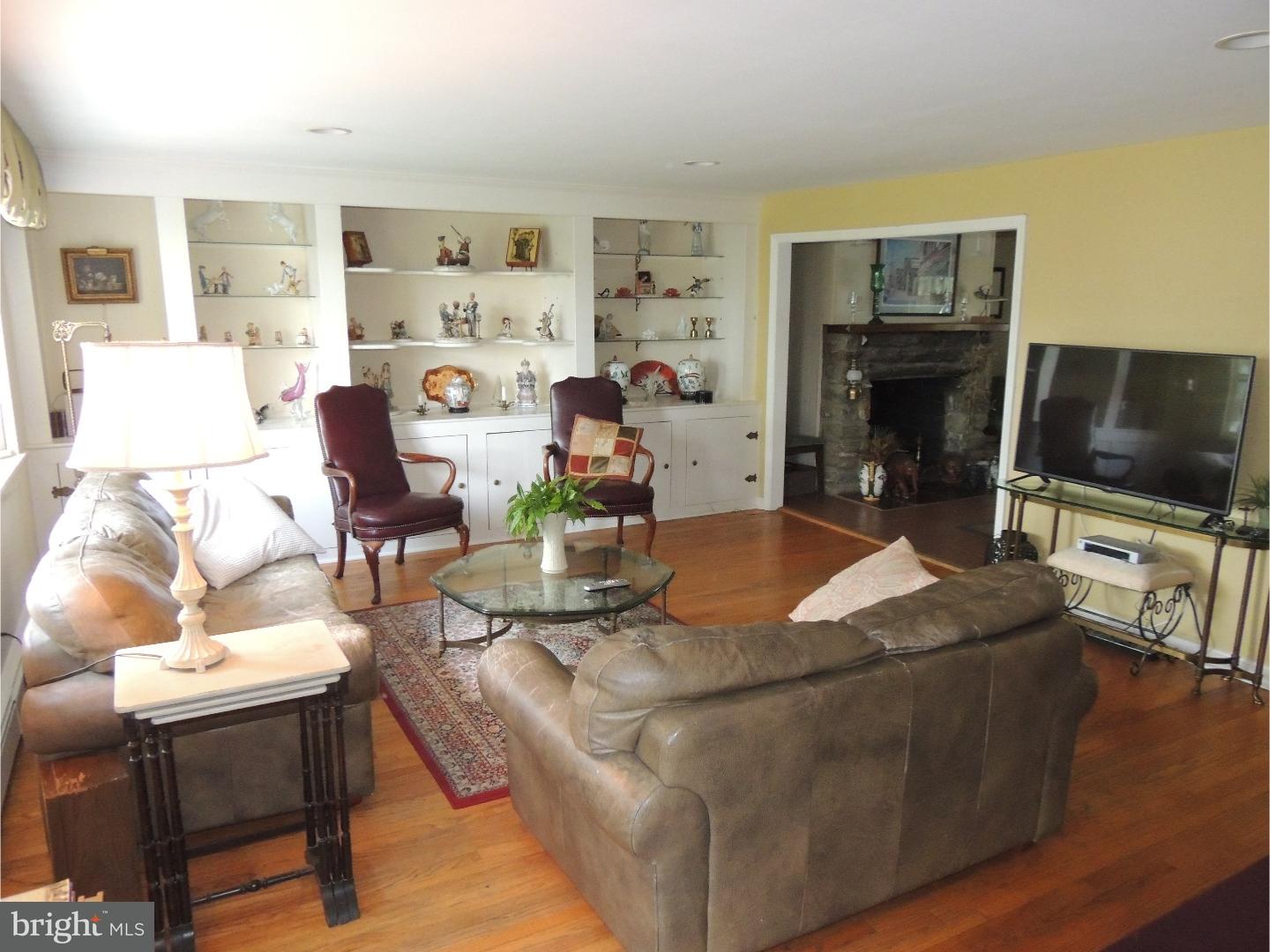2380 Steven Road Huntingdon Valley, PA 19006 - Photo 3 of 24 a living room with furniture and a flat screen tv