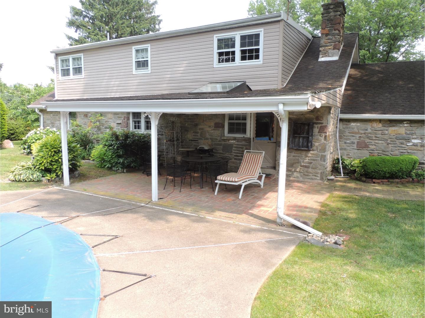 2380 Steven Road Huntingdon Valley, PA 19006 - Photo 22 of 24 a view of a house with backyard porch and sitting area
