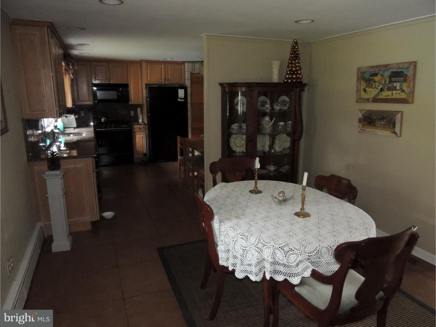 2380 Steven Road Huntingdon Valley, PA 19006 - Photo 6 of 24 a dining room with furniture and wooden floor