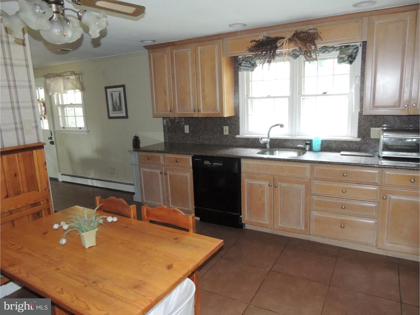 2380 Steven Road Huntingdon Valley, PA 19006 - Photo 8 of 24 a kitchen with a sink and cabinets