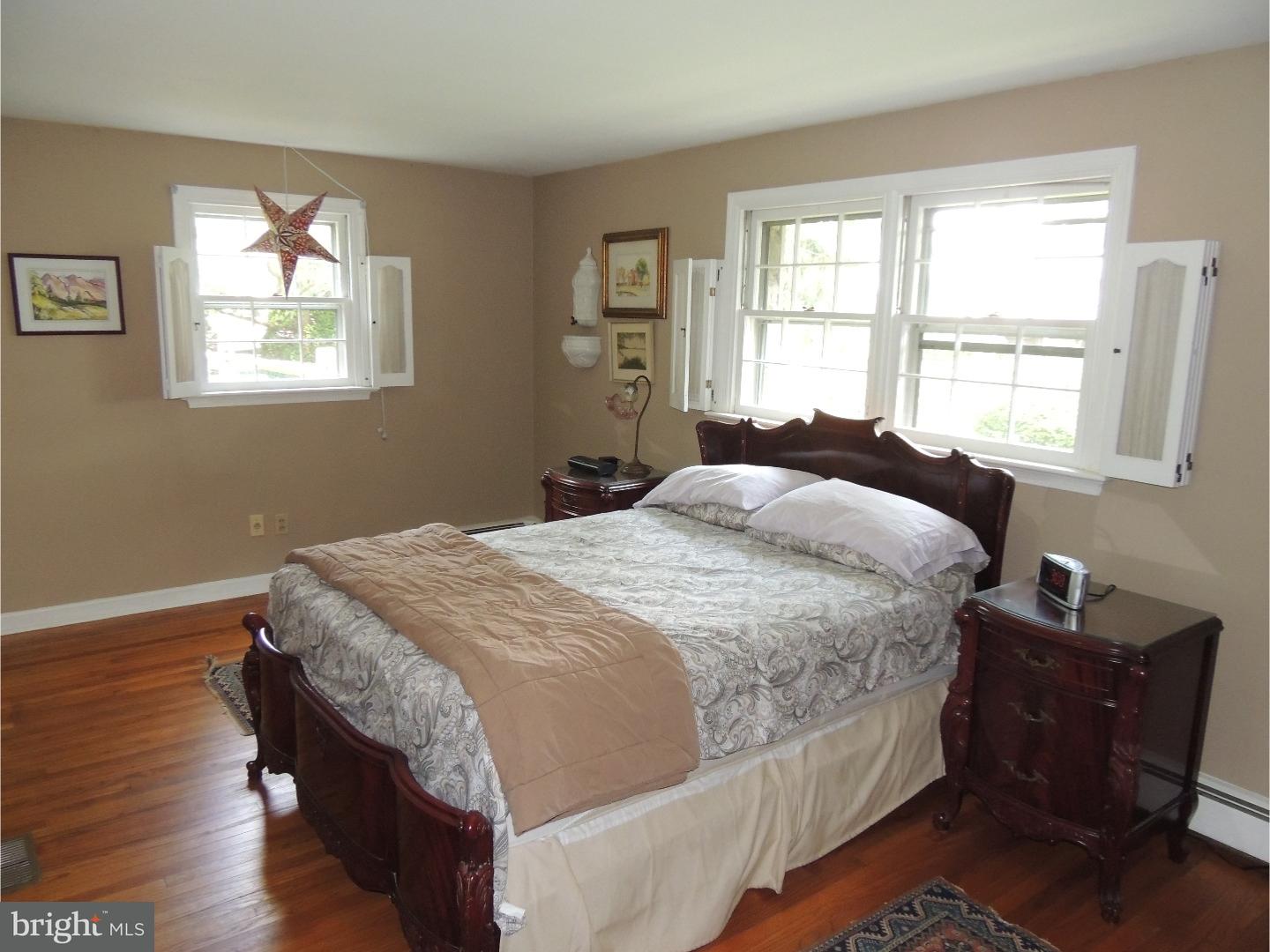 2380 Steven Road Huntingdon Valley, PA 19006 - Photo 9 of 24 a spacious bedroom with a bed and a window