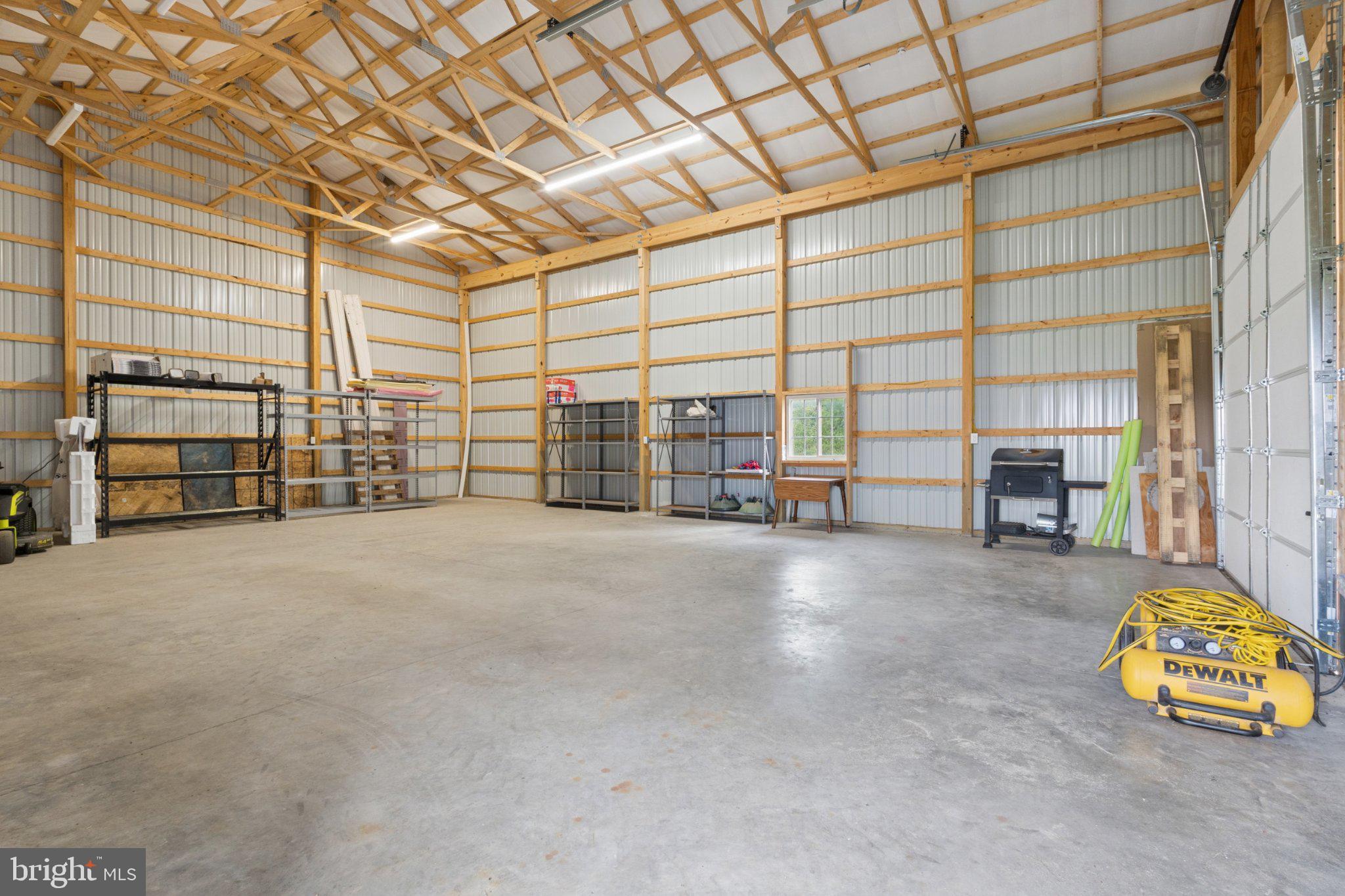 464 Sandtown Road Felton, DE 19943 - Photo 36 of 40 Spacious workshop with high ceilings.