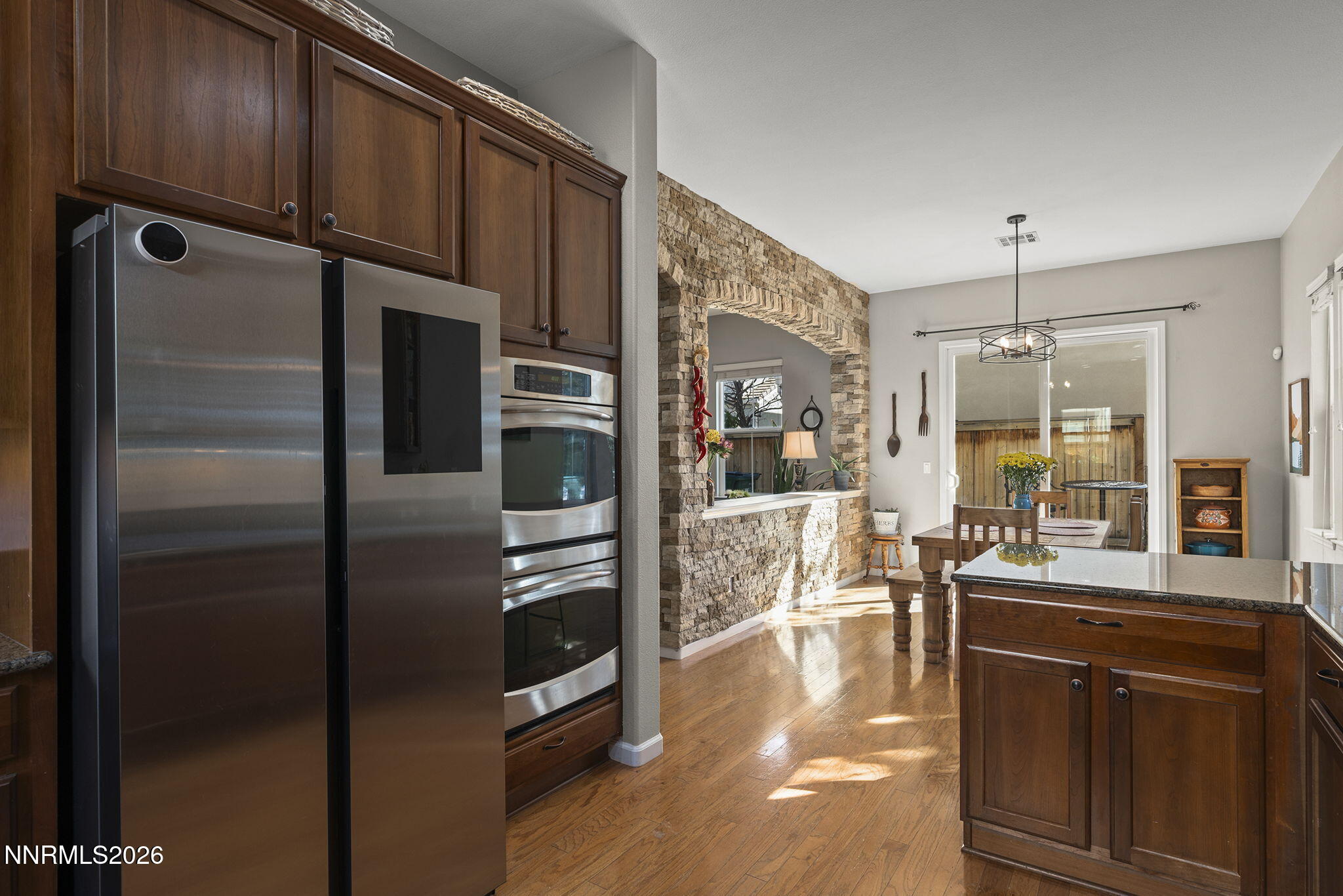 2220 Heavenly View Trail Reno, NV 89523 - Photo 11 of 29 a kitchen with stainless steel appliances granite countertop a refrigerator and a stove