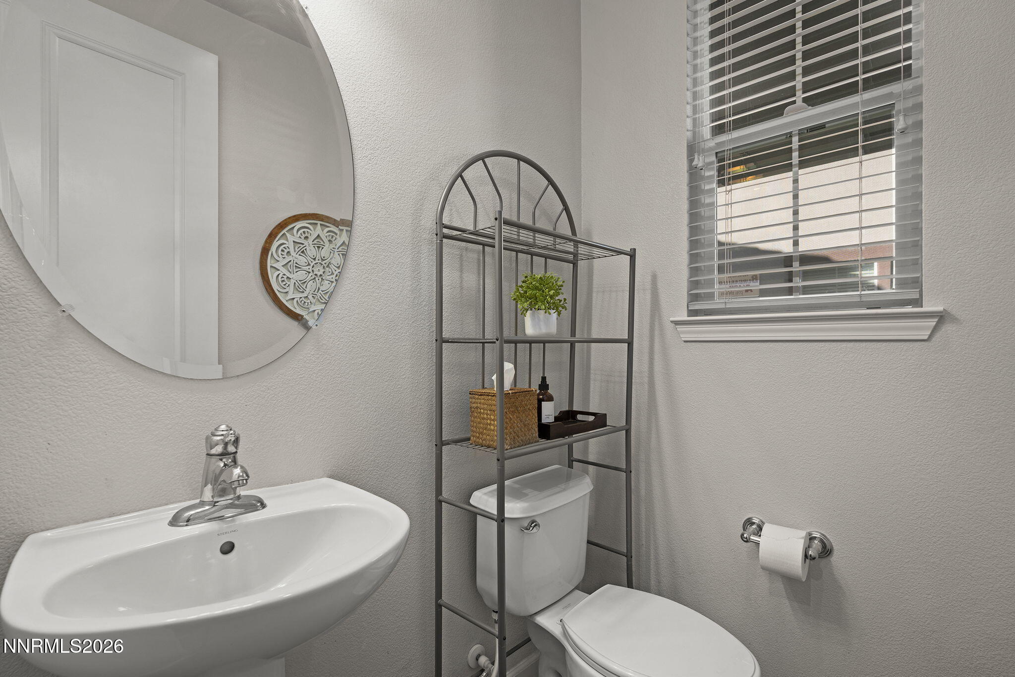 2220 Heavenly View Trail Reno, NV 89523 - Photo 12 of 29 a bathroom with a toilet a sink and mirror