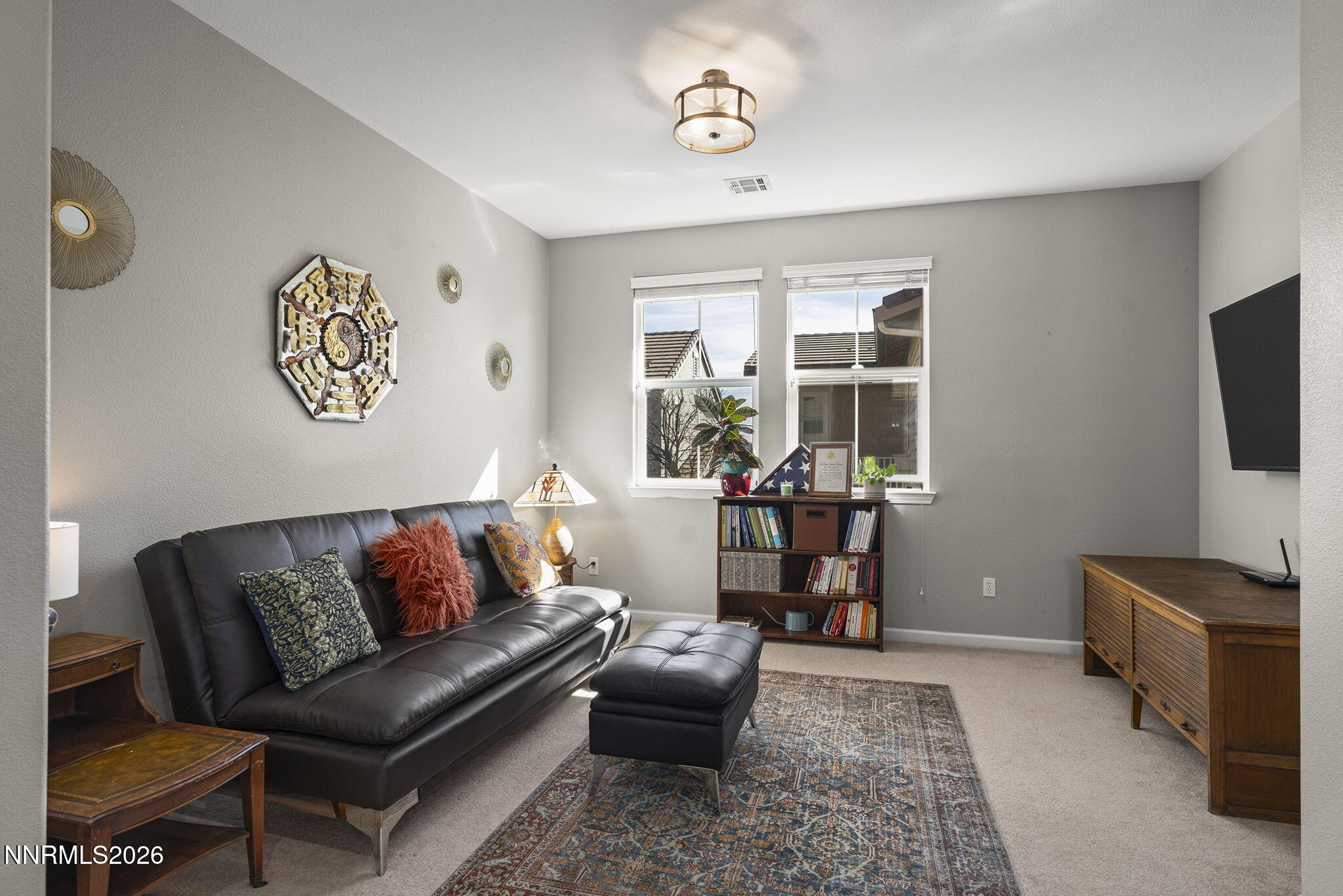 2220 Heavenly View Trail Reno, NV 89523 - Photo 15 of 29 a living room with furniture and a flat screen tv