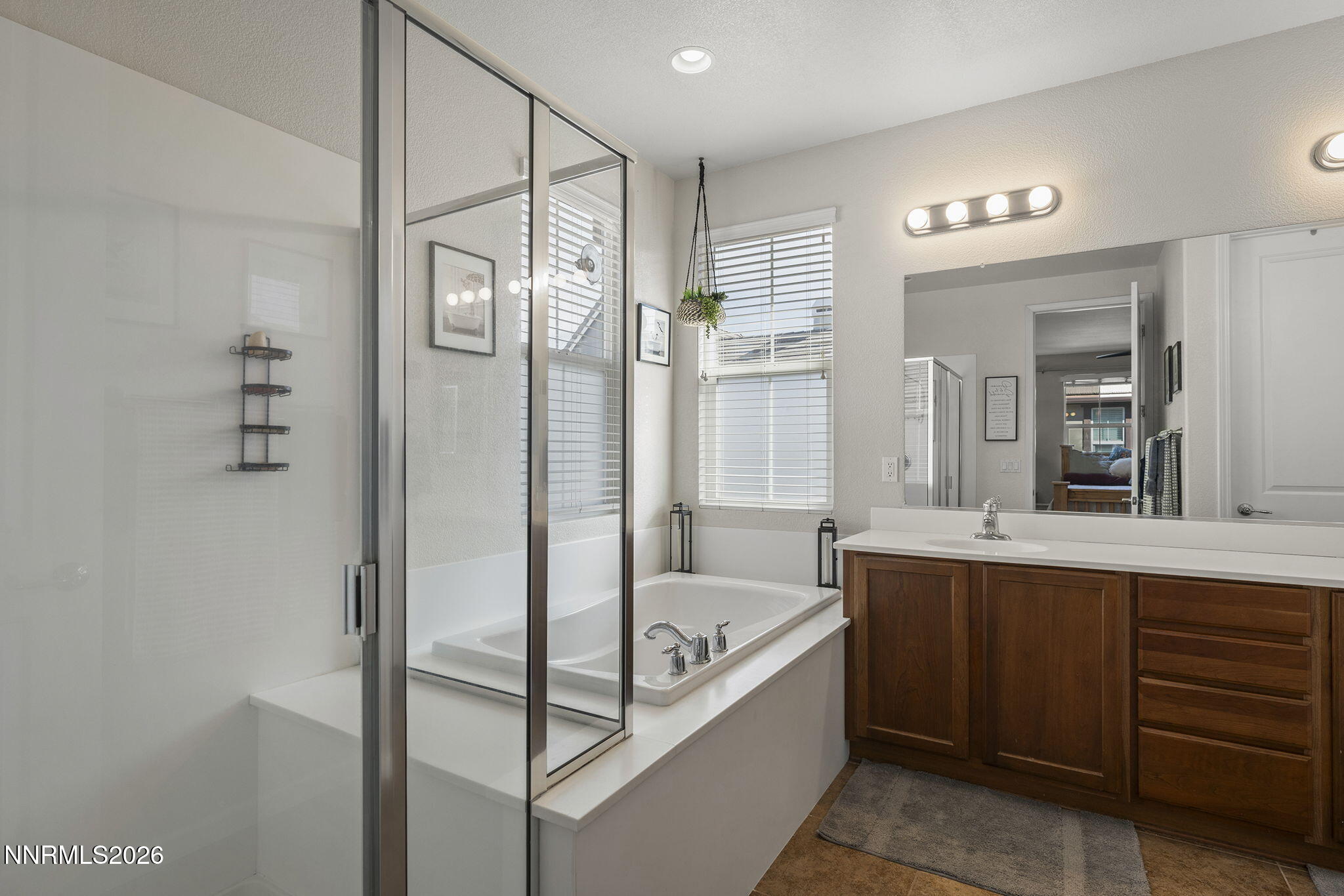 2220 Heavenly View Trail Reno, NV 89523 - Photo 17 of 29 a bathroom with a bathtub and double vanity