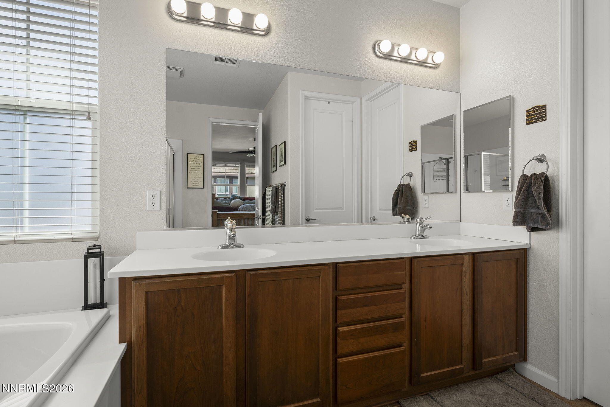 2220 Heavenly View Trail Reno, NV 89523 - Photo 19 of 29 a bathroom with a sink and a mirror