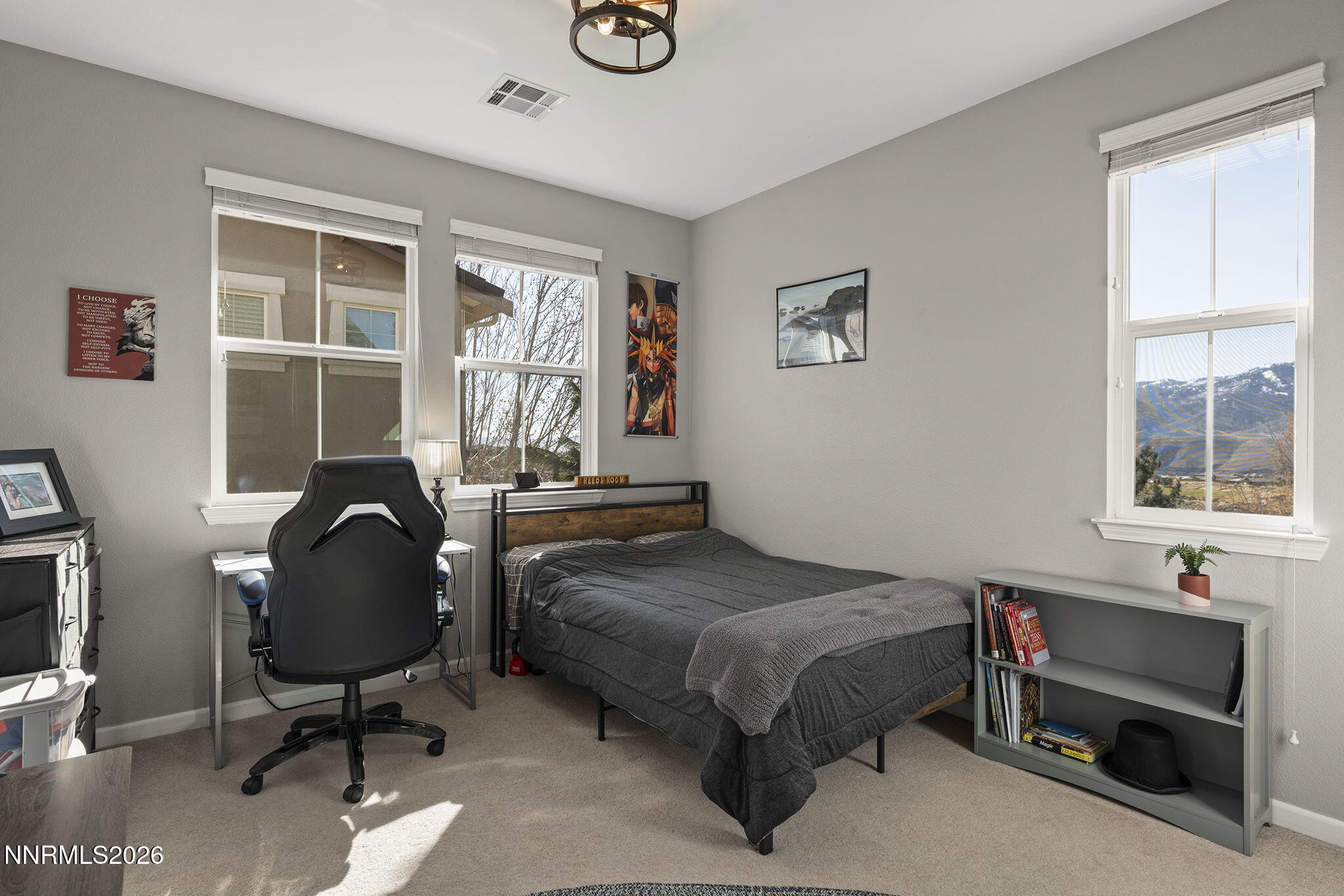 2220 Heavenly View Trail Reno, NV 89523 - Photo 20 of 29 a bedroom with a bed chair and a window